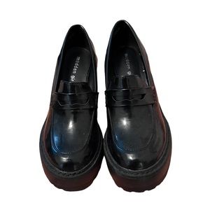 Black platform loafers
